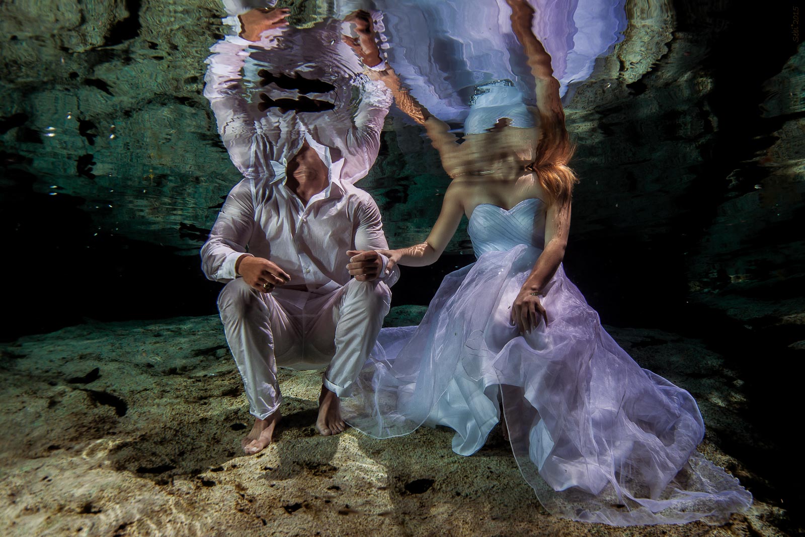 Fine art underwater photos after wedding