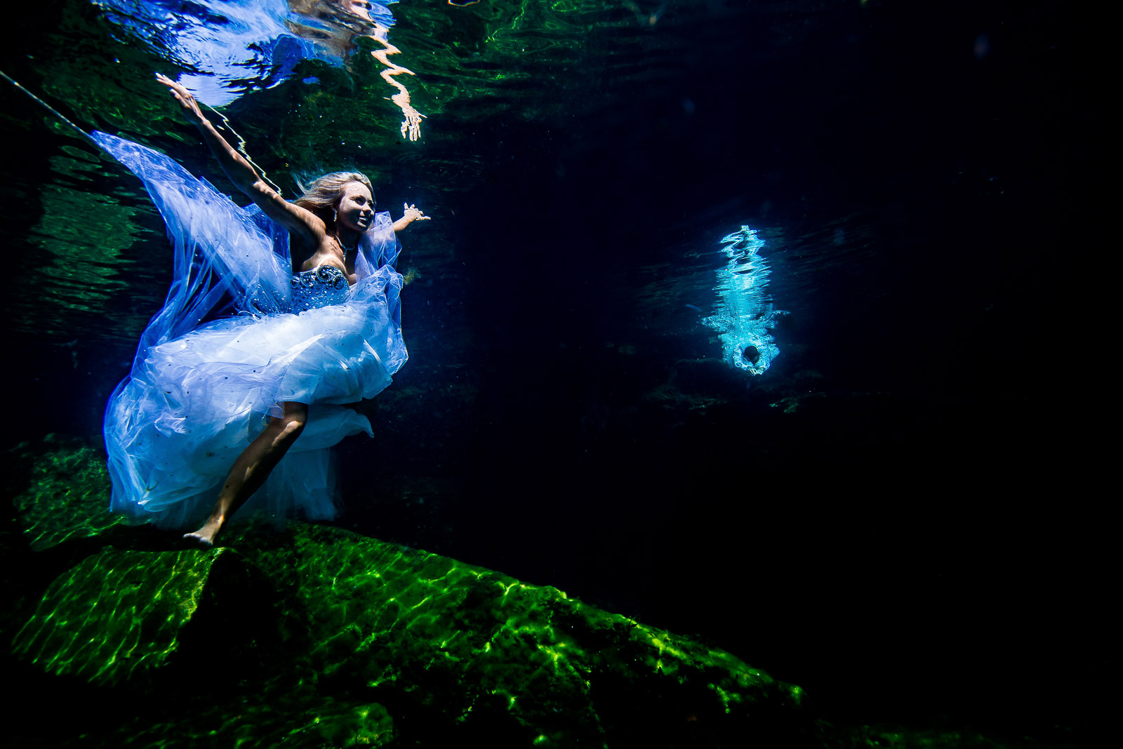 Post wedding underwater photography trash the dress