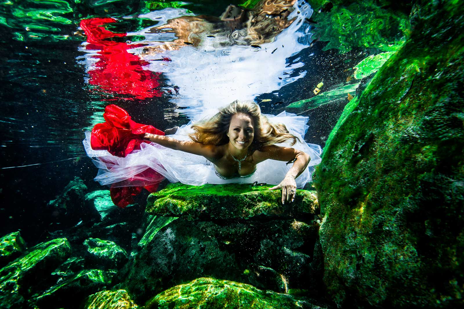 Post wedding underwater photography trash the dress