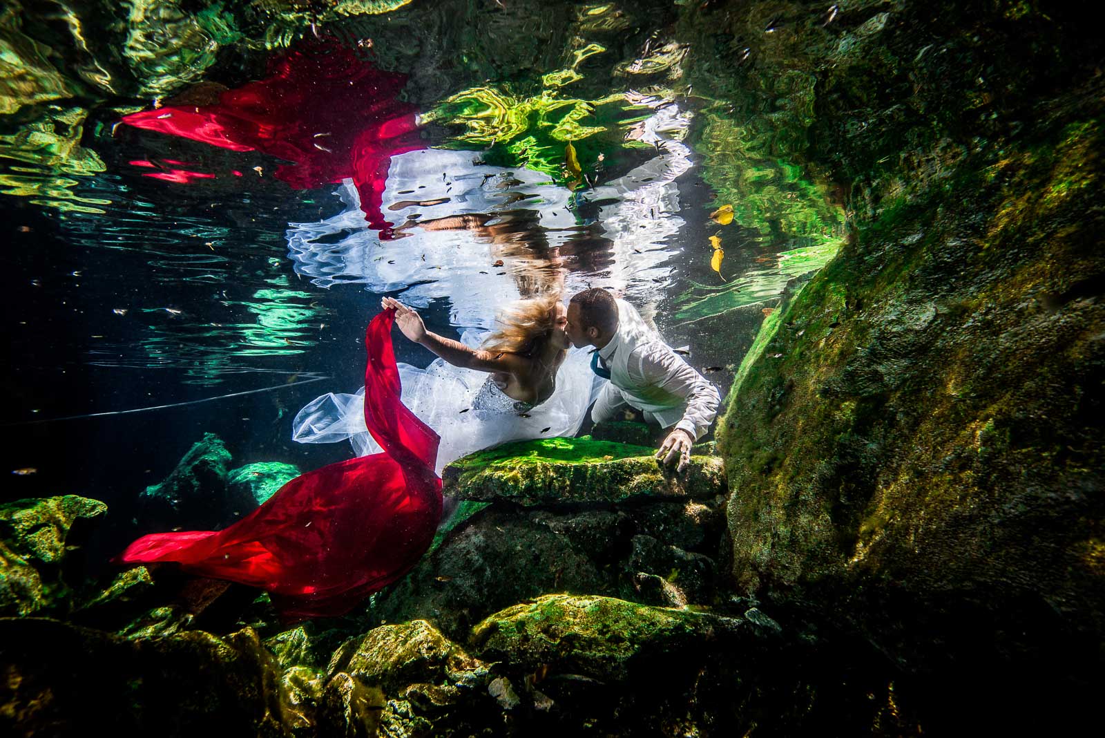 Post wedding underwater photography trash the dress