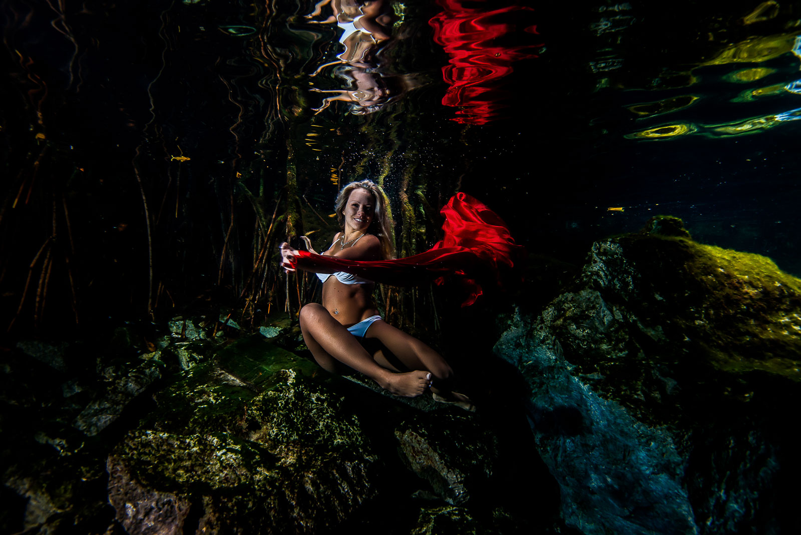 Post wedding underwater photography trash the dress