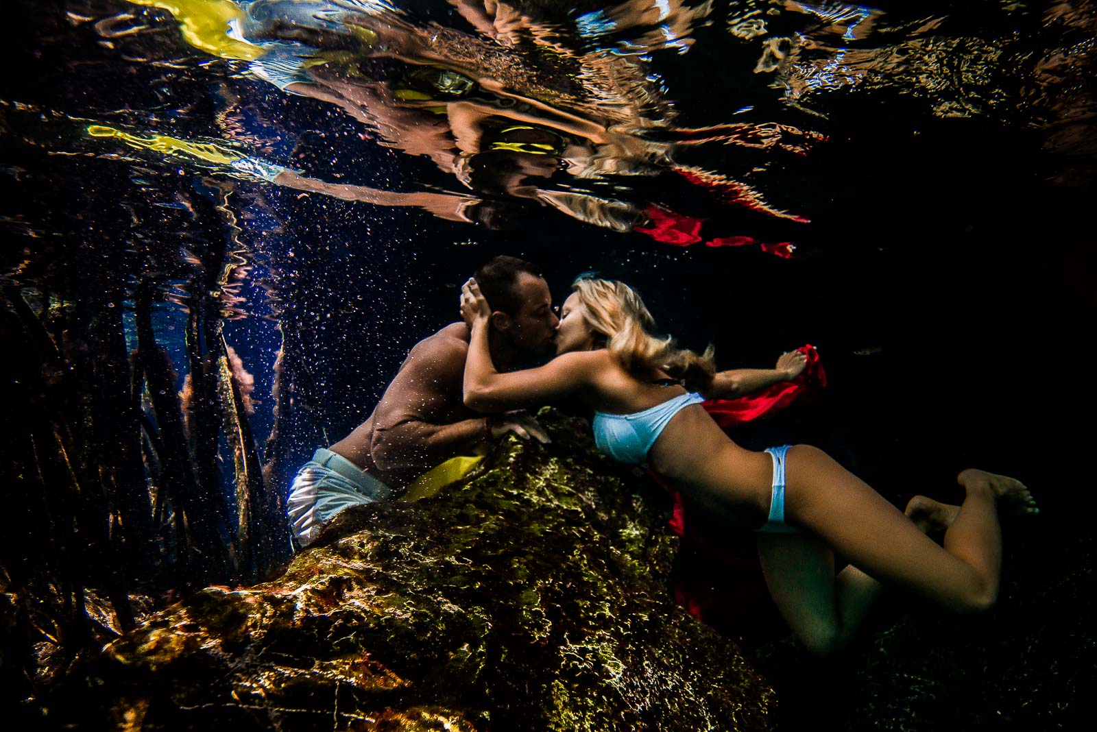 Post wedding underwater photography trash the dress