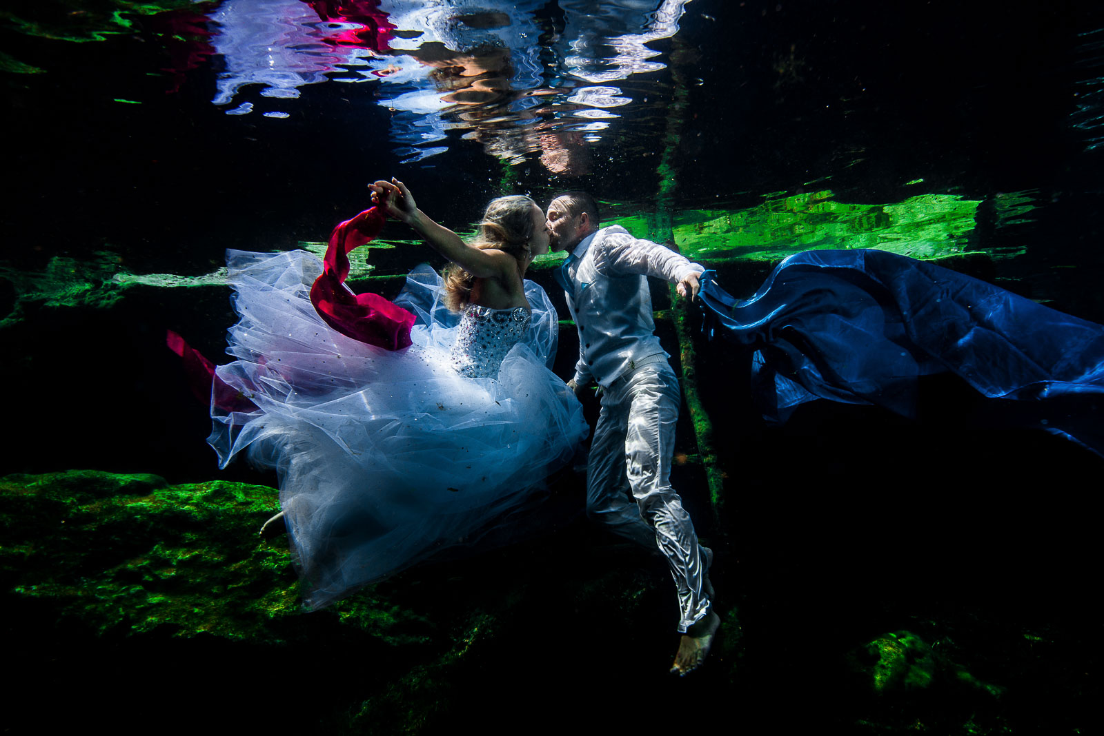 Post wedding underwater photography trash the dress